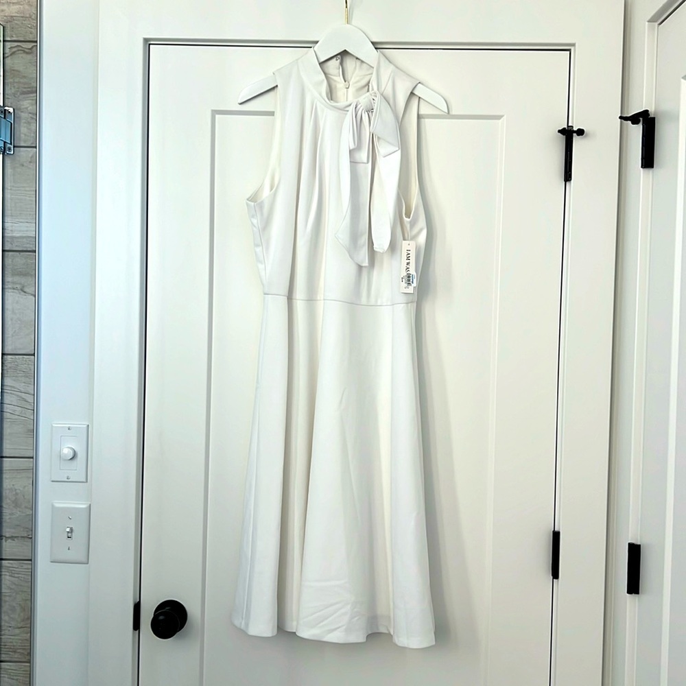 NWT. White dress. Lined. Size 14  Shelby and Palmer brand.